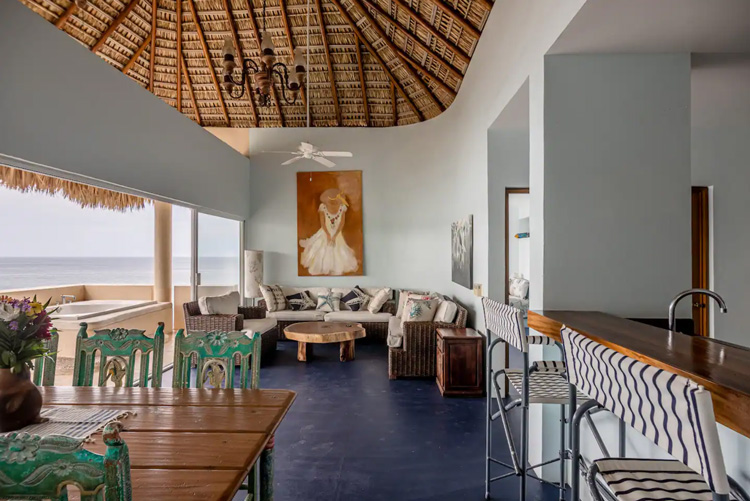 living room and kitchen bar area
